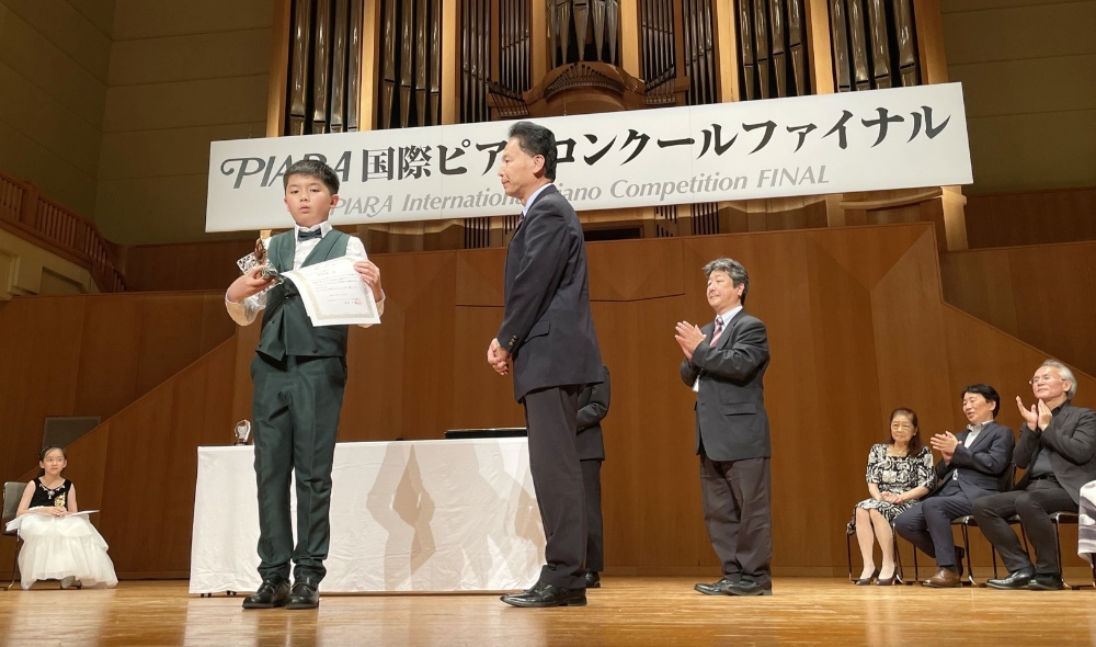 ▲來自台灣的12歲音樂學子吳學焱斬獲三項國際大獎。(圖/橘焱胡同企業提供)